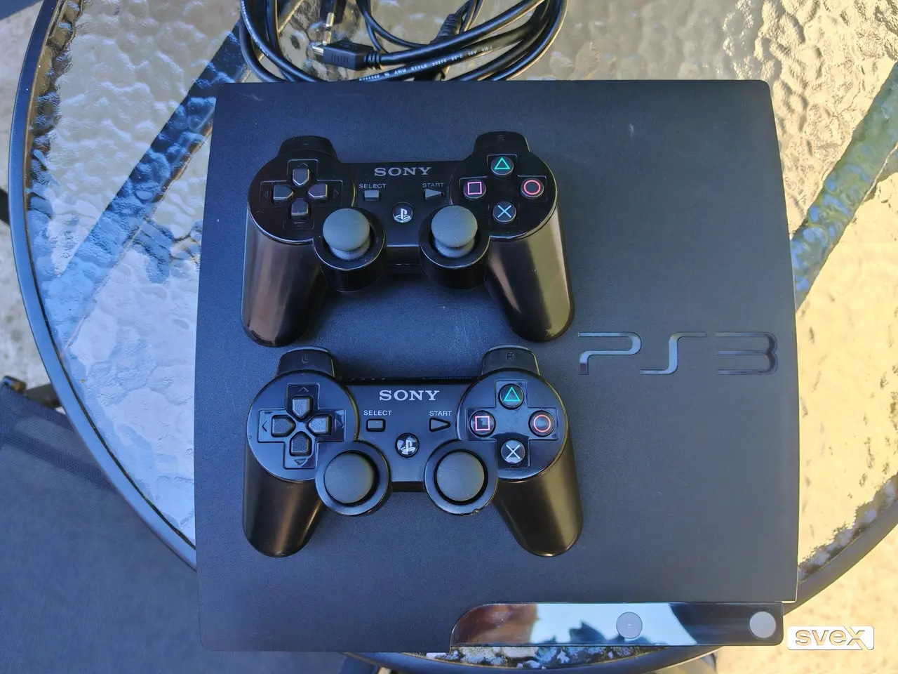 PlayStation 3 Slim CIPOVAN/MODOVAN + dzojstik + 10+ igrica