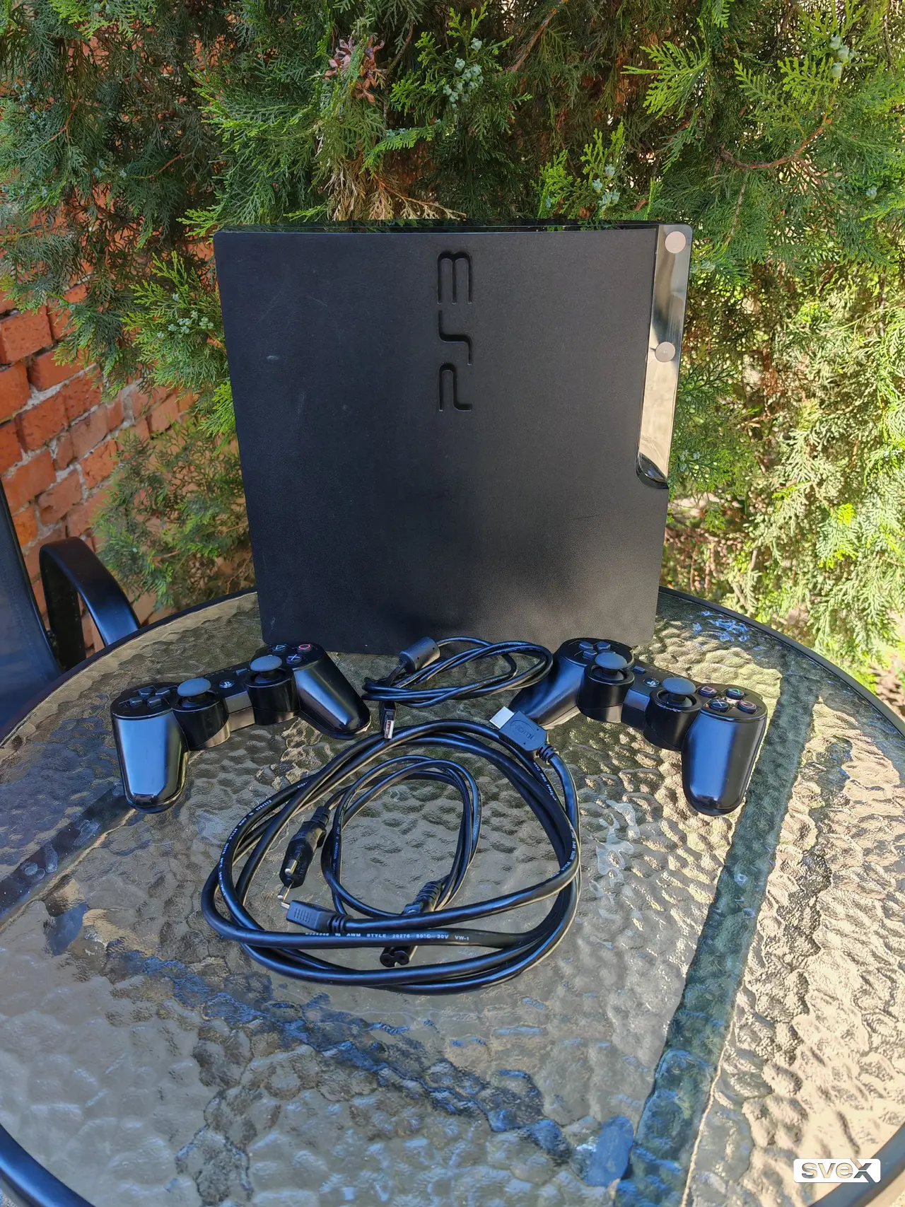 PlayStation 3 Slim CIPOVAN/MODOVAN + dzojstik + 10+ igrica