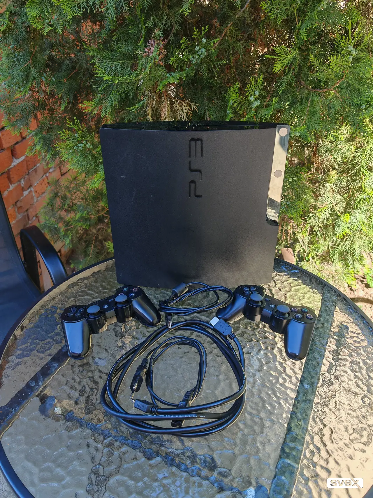 PlayStation 3 Slim CIPOVAN/MODOVAN + dzojstik + 10+ igrica
