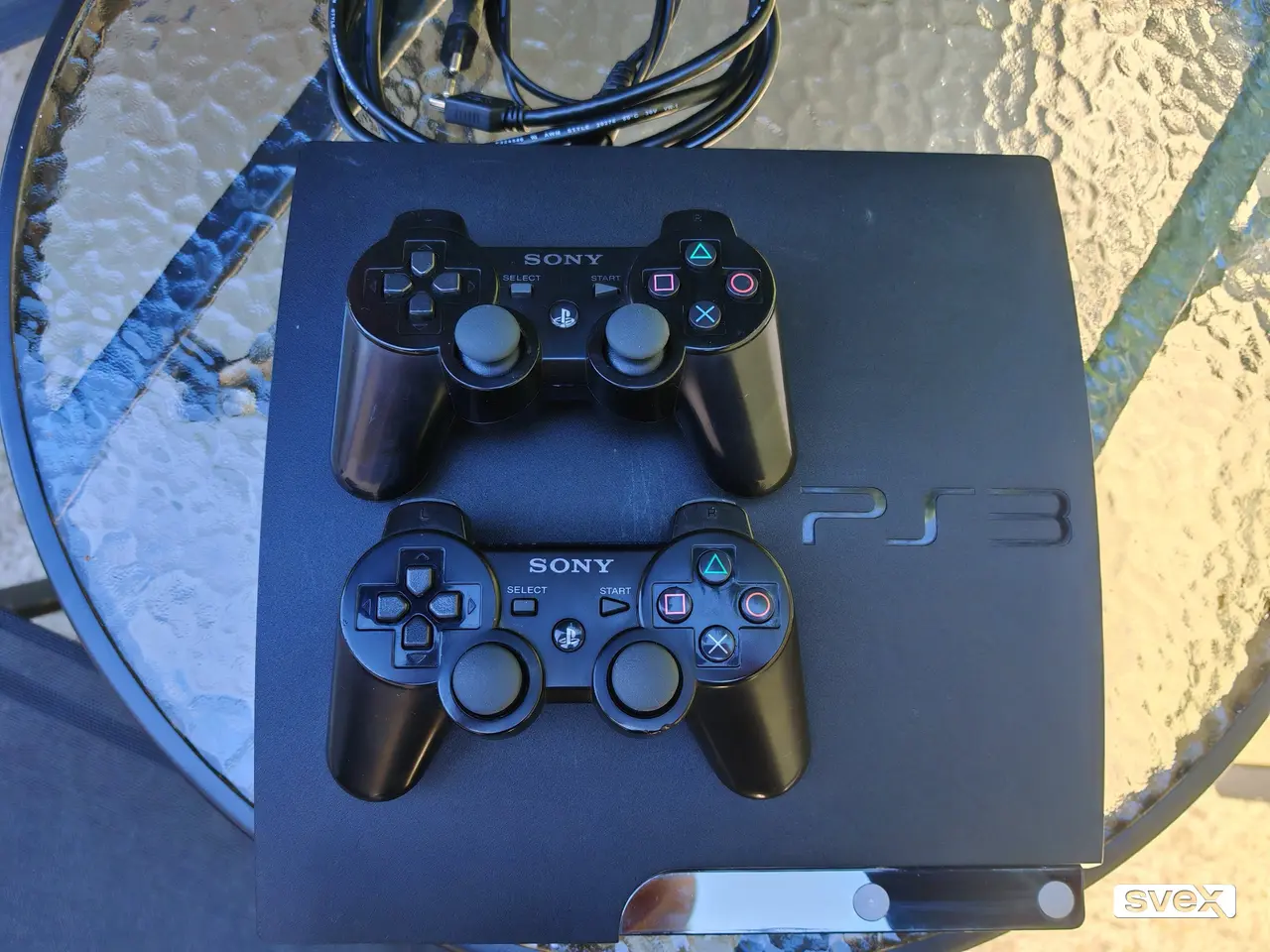 PlayStation 3 Slim CIPOVAN/MODOVAN + dzojstik + 10+ igrica