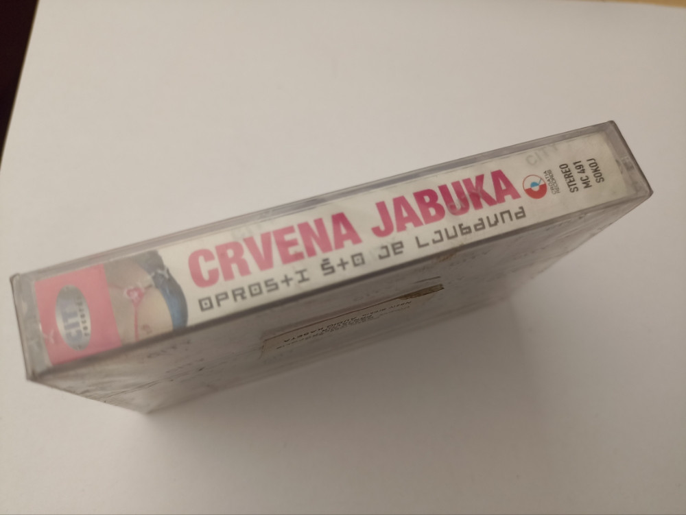CRVENA JABUKA - OPROSTI STO JE LJUBAVNA AUDIO KASETA