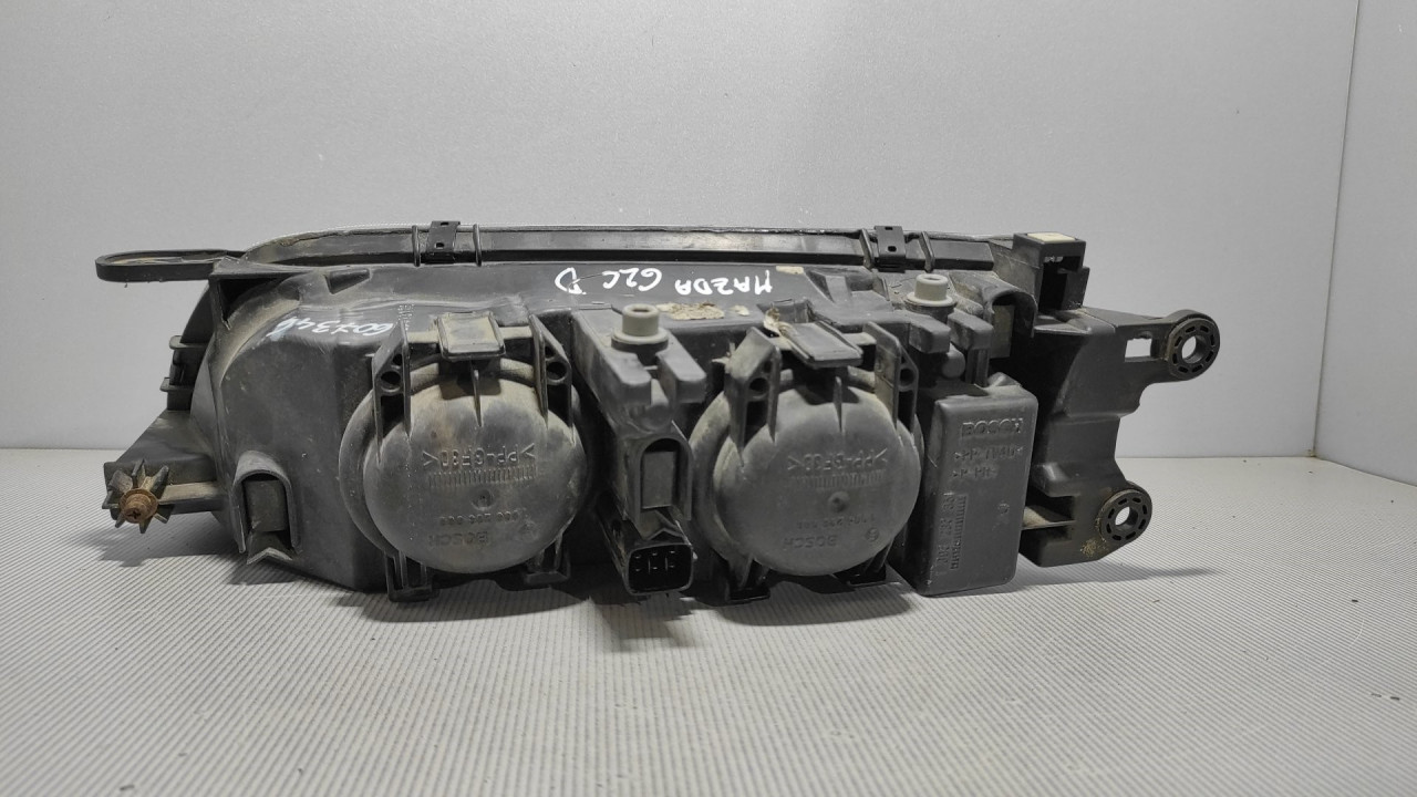 DIJELOVI FAR MAZDA 626 > 97-01 1305623044